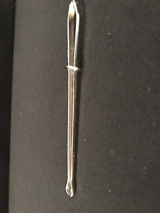 Outil passe-élastique